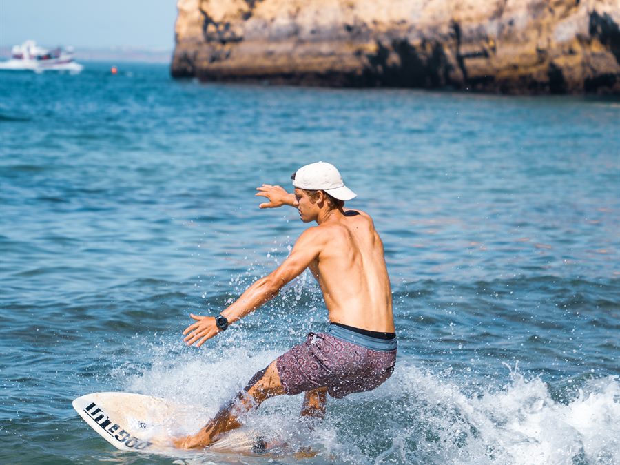 Skimboarding in the shore break